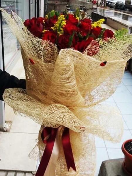 Jute Wrapped Bunch of 24 Red Roses
