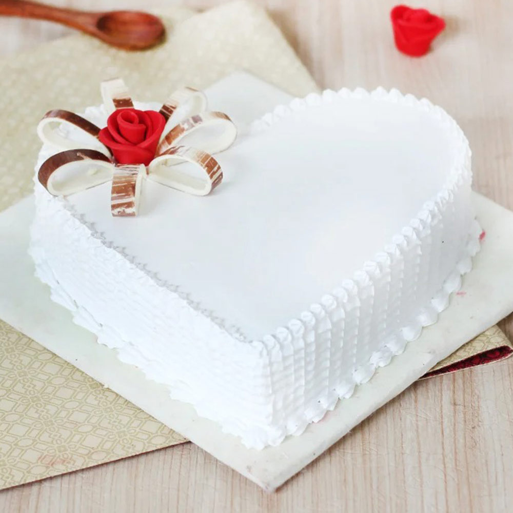Order Heart-Shaped Vanilla Cake with Flower Brooch - Free Delivery ...